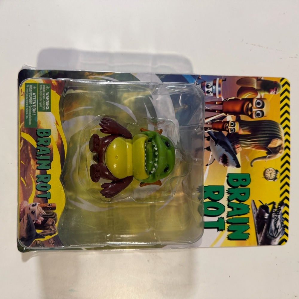 Green and Brown Toy Figure